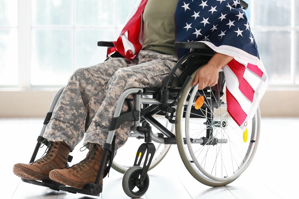 A disables veteran sitting in a wheel chair. Disability is one of the criteria to determine eligibility for the Veterans Home Care Program